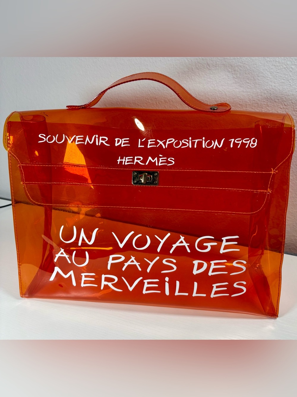 HERMES Vintage Orange Transparent Vinyl,  Souvenir De L'Exposition Kelly Bag